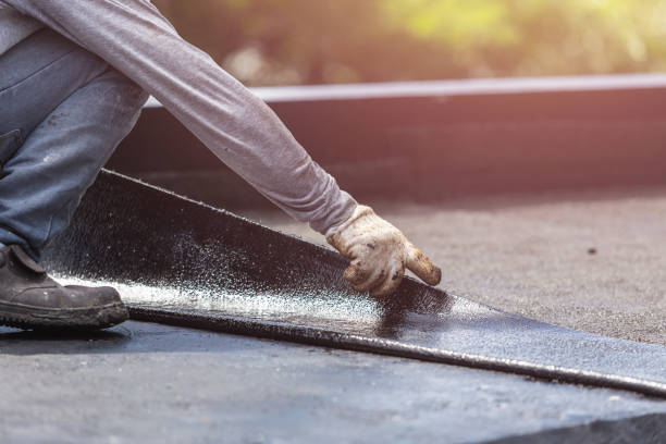 Professional Basement Waterproofing technician working in Lexington, VA